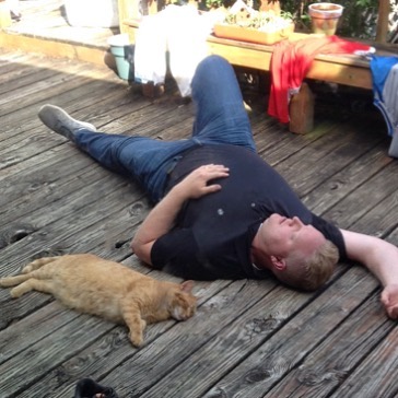 My family loves me so much, they take pictures of me being lazy next to the cat. – Trevor